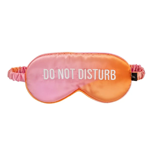 Masque de nuit Do Not Disturb en satin rose-orangé pour sommeil réparateur avec touche décalée