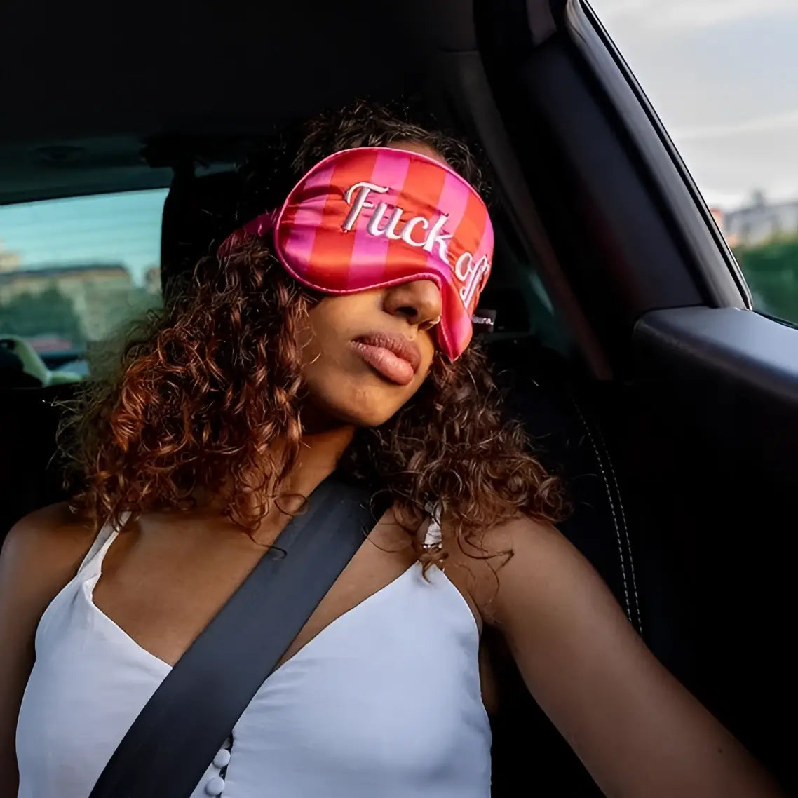 Masque de sommeil fuck off rose et orange rayé pour obscurité totale