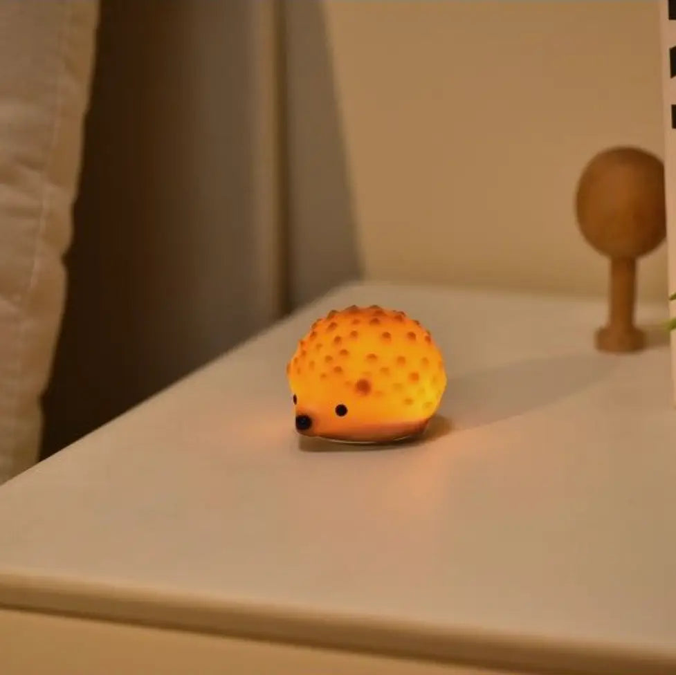 Mini veilleuse hérisson rechargeable orange chaleureuse avec yeux noirs