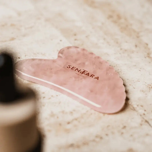 Outil gua sha coeur quartz rose pour relaxation profonde visage