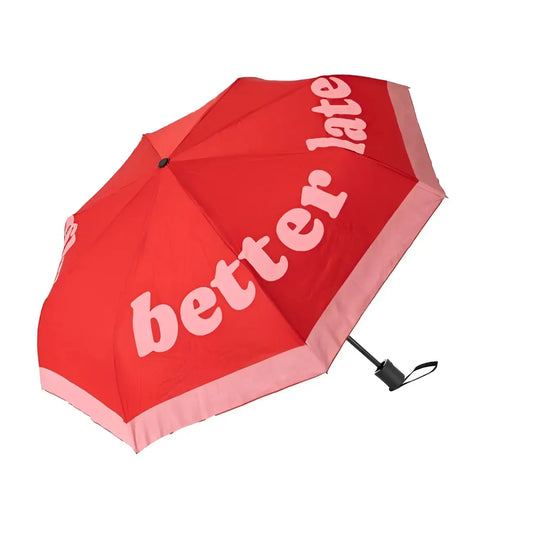 Parapluie pliant rouge et rose avec ’better late’ blanc, compact et résistant