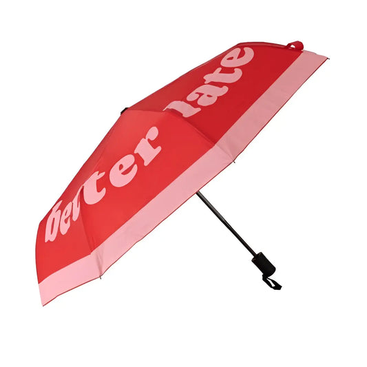 Parapluie pliant rouge et rose Better Late Than Ugly avec texte better late