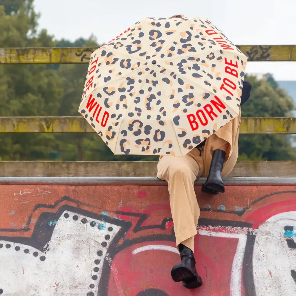 Parapluie léopard Born to be wild avec message born et mécanisme automatique vents violents