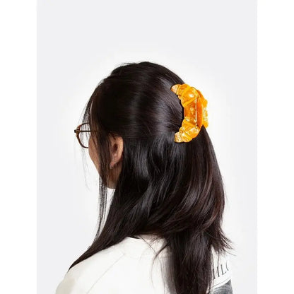 Pince à cheveux originale en plastique ambré translucide texturé