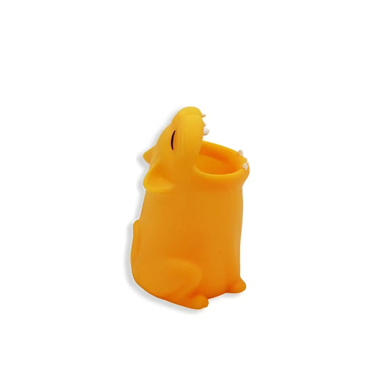 Porte-brosse à dents dinosaure orange silicone avec bouche ouverte et dents blanches