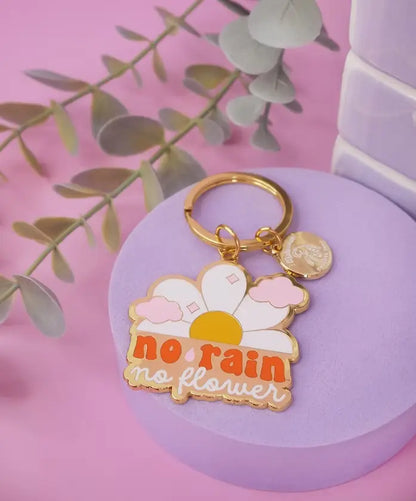 Porte-clé inspirant No Rain No Flowers avec détails dorés, idée cadeau