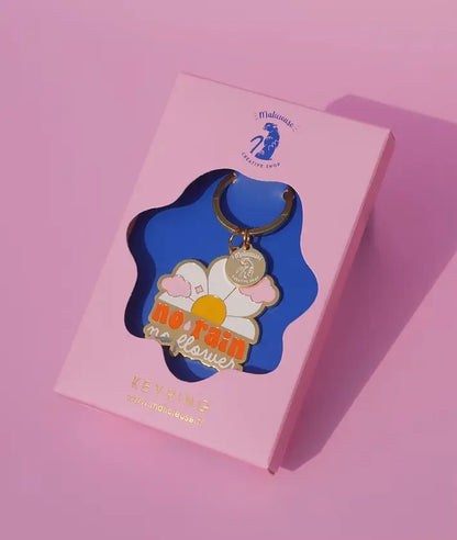 Porte-clé inspirant No Rain No Flowers avec détails dorés, idée cadeau