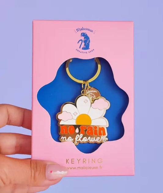 Porte-clé inspirant No Rain No Flowers avec détails dorés, idée cadeau