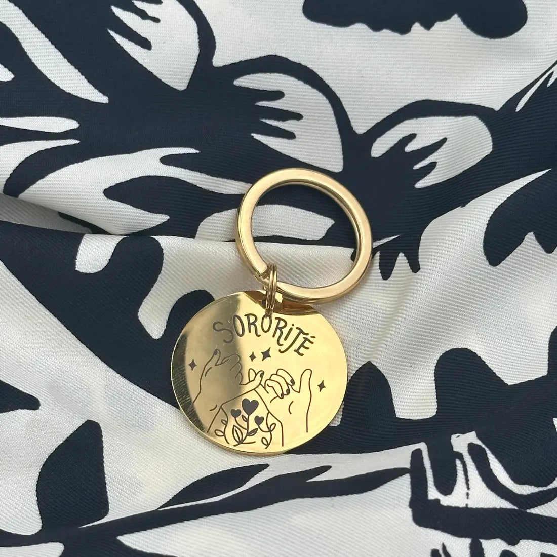 Porte-clé sororité en acier inoxydable doré, symbole de solidarité féminine