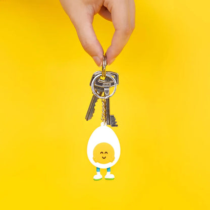 Porte-clés design Eggo jaune souriant, inspiré culture japonaise
