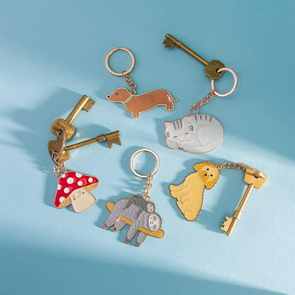 Porte-clés teckel mignons en émail, design unique d’animaux pastels