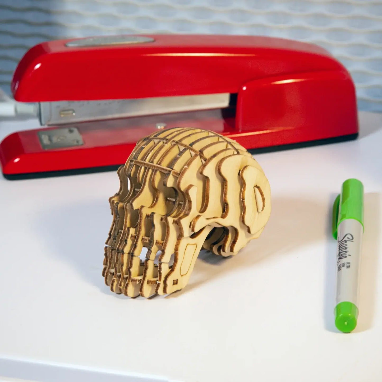 Puzzle 3D bois skull : pièce en bois clair superposée, exposer fièrement