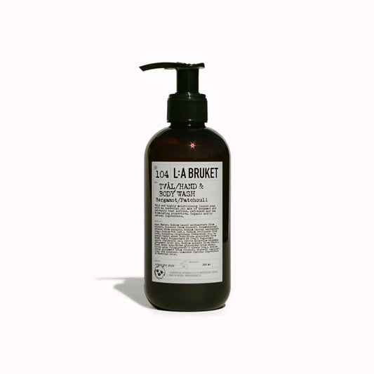 Bouteille en verre ambré avec pompe noire pour savon main corps liquide bergamotte