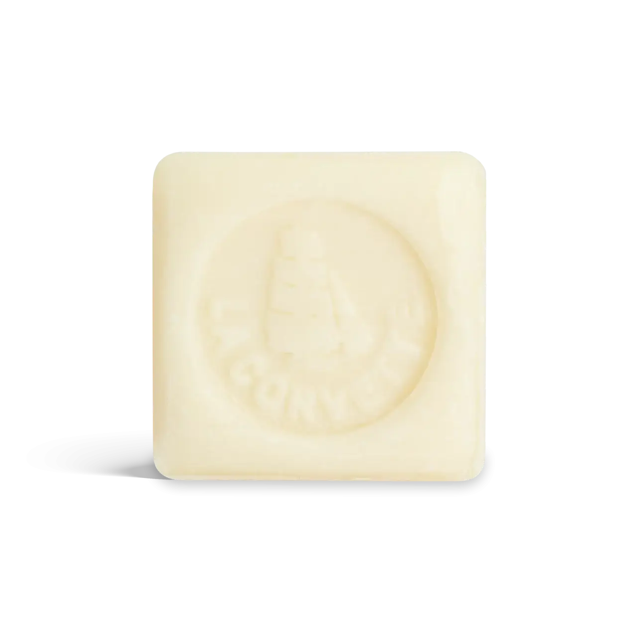Savon solide lait d’ânesse jaune clair carré avec indentation