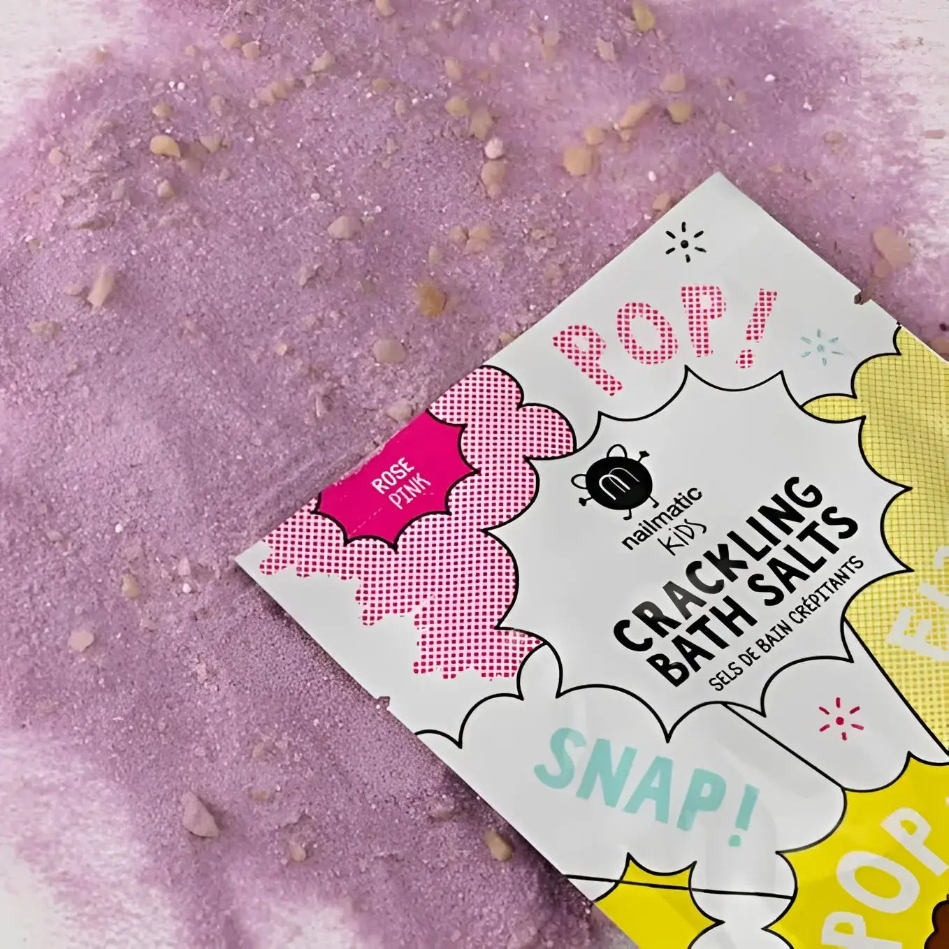 Sels de bain crépitants rose pour enfant, formulation douce pour peau fragile