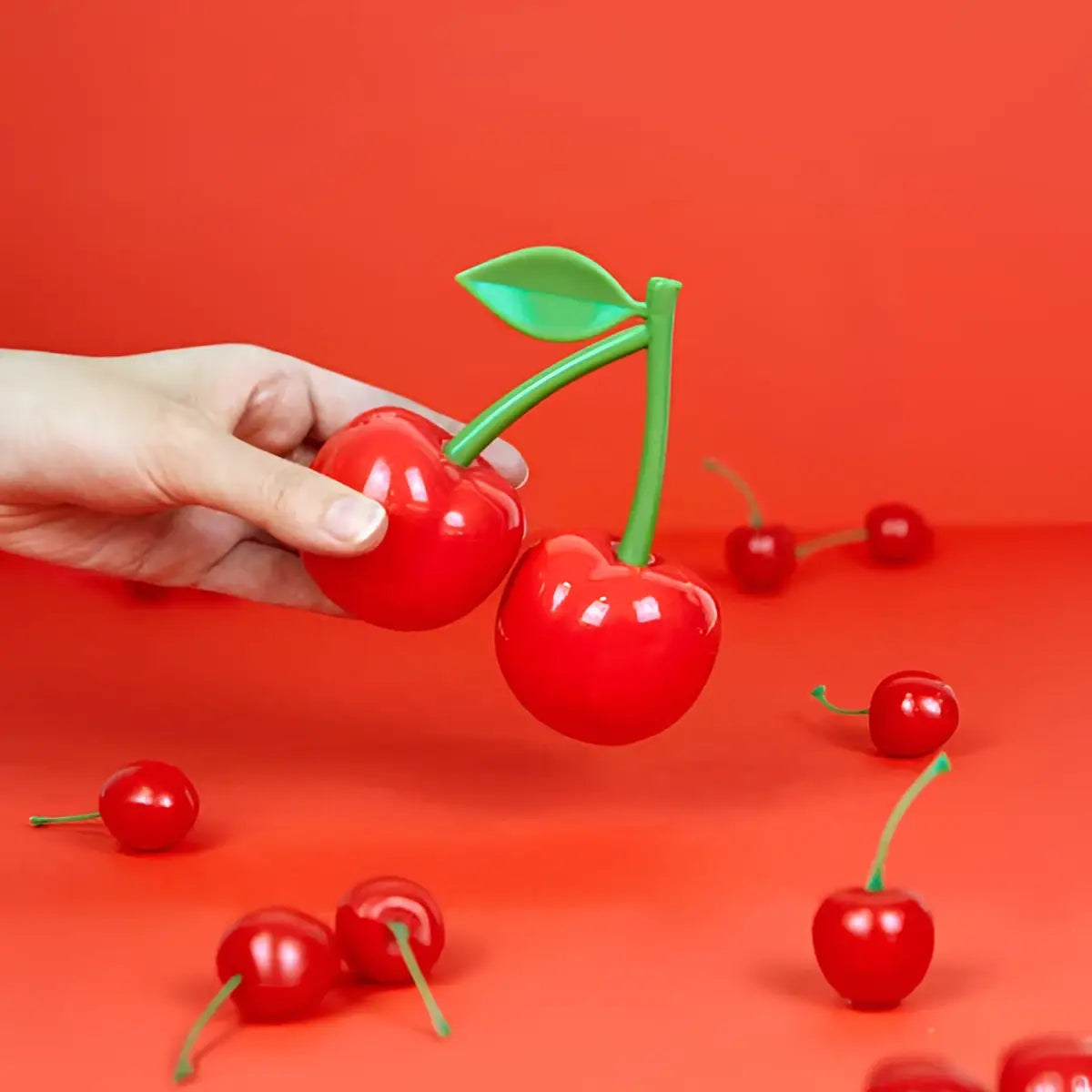 Porte-clés cerises rouges en plastique cherry rouge poivre