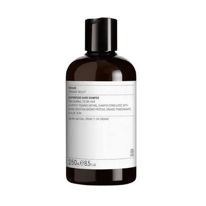 Shampoing brillance Evolve Organic Beauty en bouteille ambrée pour cheveux secs