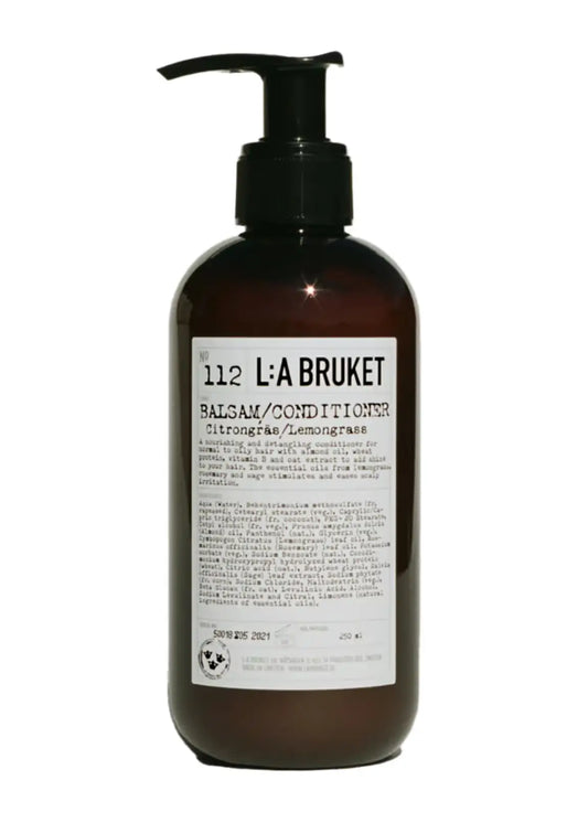Bouteille de shampoing liquide citronnelle 240ml au parfum vivifiant d’agrumes pour fibre capillaire
