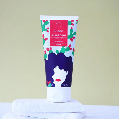 Tube blanc de shampoing nourrissant à lhuile de figue de barbarie, texture crémeuse