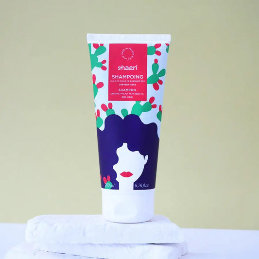 Tube blanc de shampoing nourrissant à lhuile de figue de barbarie, texture crémeuse