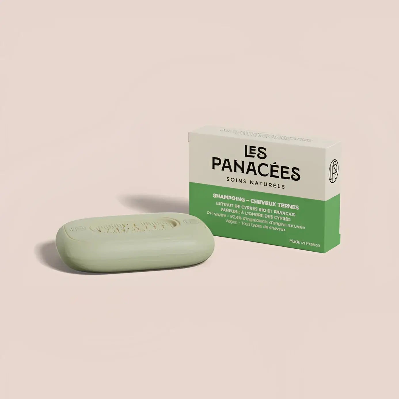 Shampoing solide naturel À L’Ombre Du Cypres en barre verte avec emballage papier zéro déchet