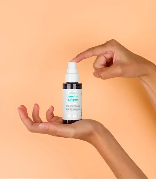 Spray Lavant Menthe Figue 50ml en flacon noir sleek avec parfum unique