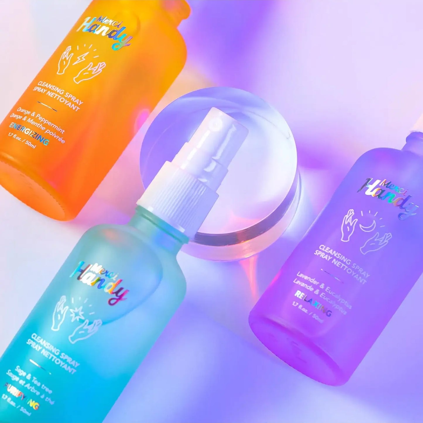 Trois flacons spray nettoyant colorés 50mL, parfums subtils orange, lavande et sauge
