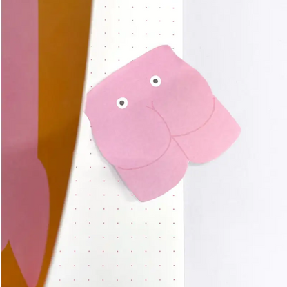 Sticker fesses en forme de pêche rose avec yeux googly, parfait pour stickers espiègles