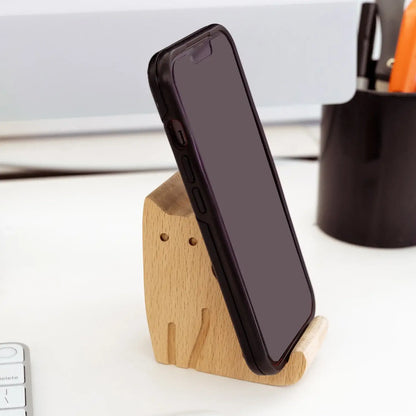 Support téléphone chat en bois clair, design félin et compagnon fiable