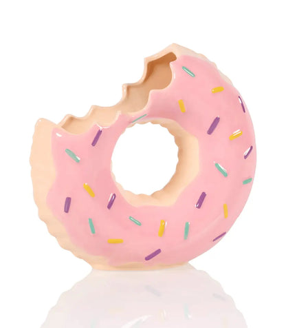 Donut flottant déco rose avec bouchée et sprinkles colorés