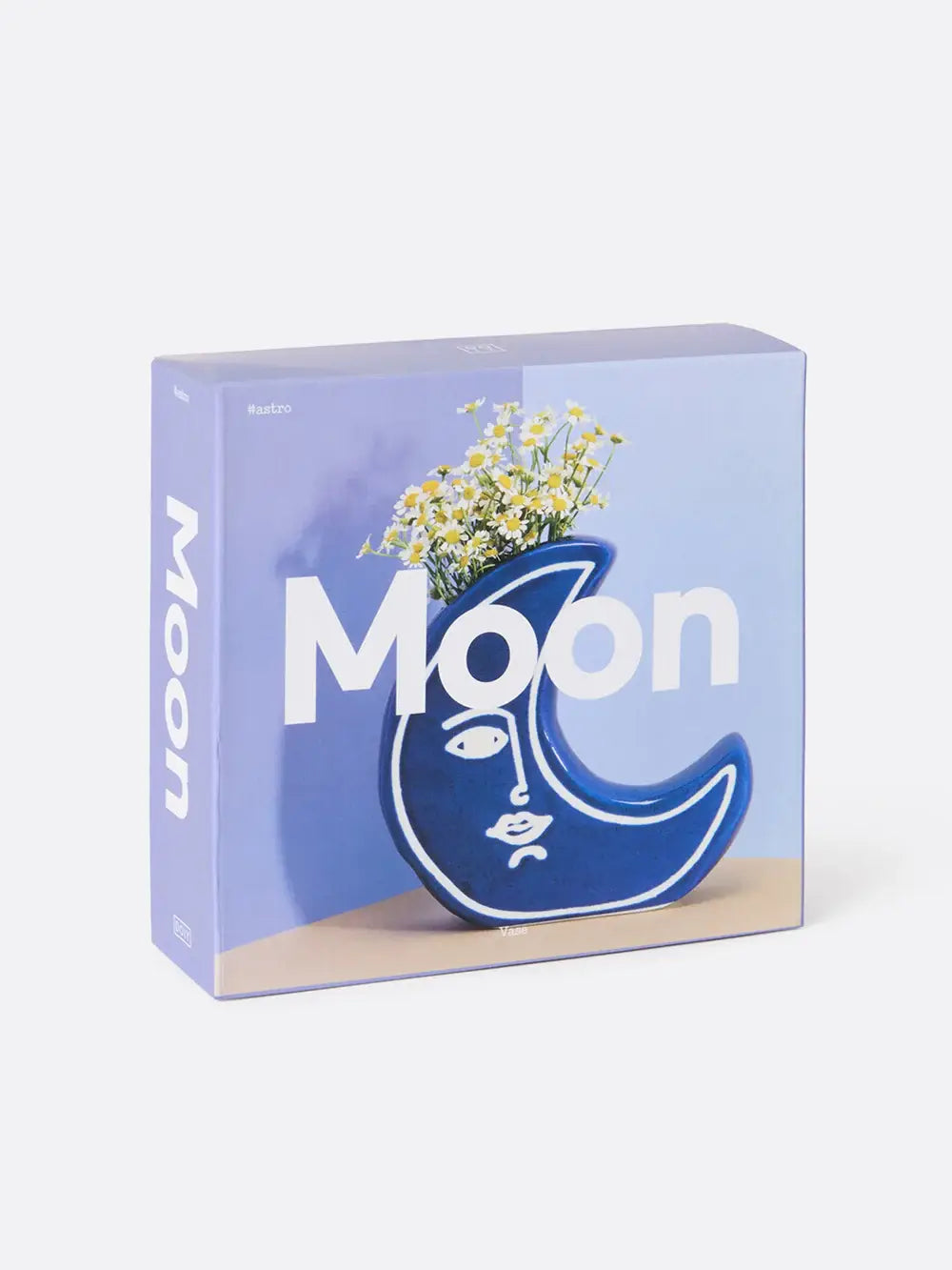 Vase Moon Évoque : pot céramique bleu lune avec silhouette Évocatrice et fleurs jaunes
