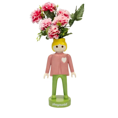 Figurine Playmobil rose sur vase céramique rose, souvenir d’enfance