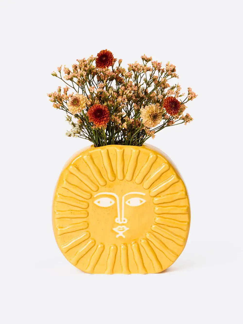 Vase Soleil jaune céramique en motif solaire avec visage stylisé